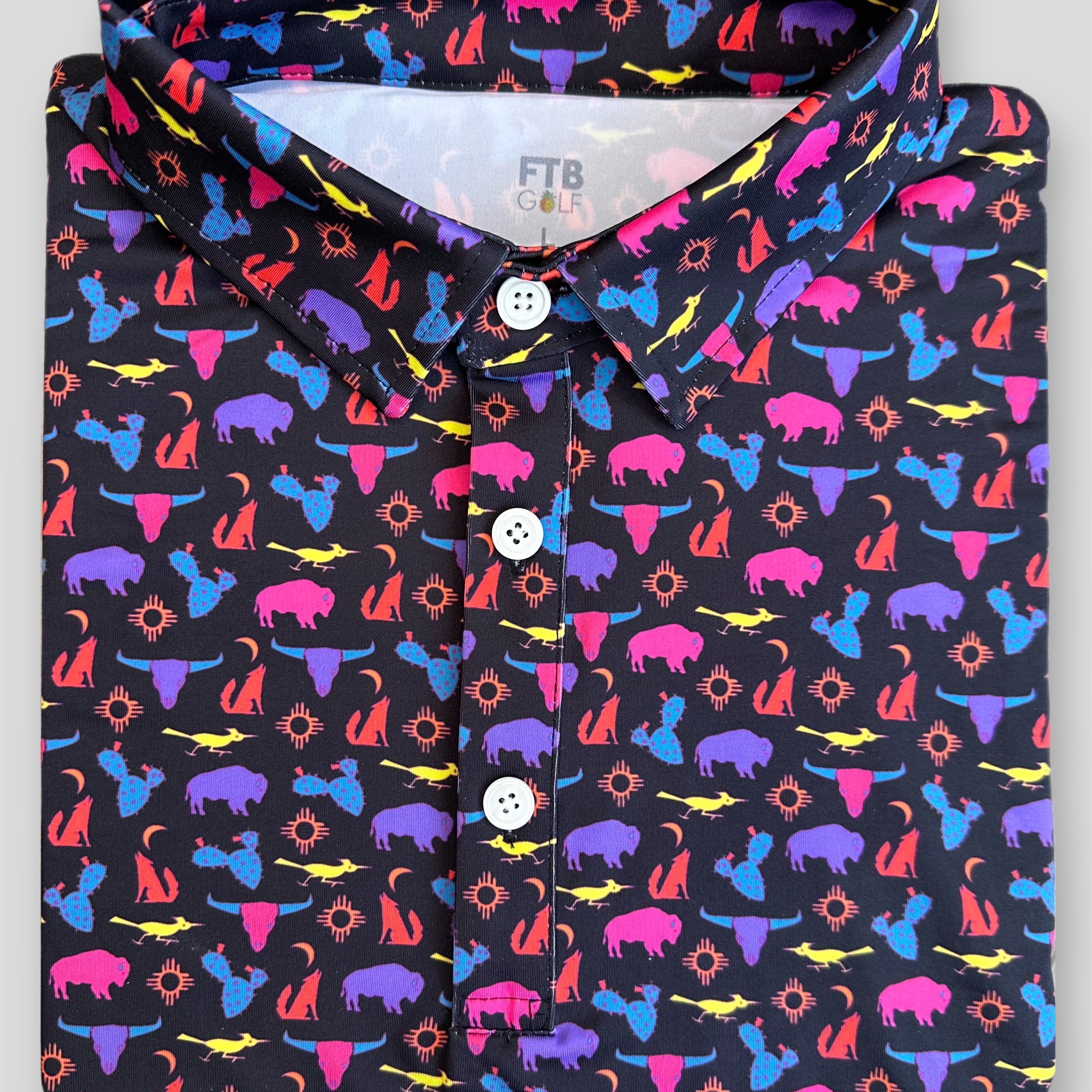 FTB Golf southwestern desert polo made with moisture wicking performance material. It has cactus, buffalos, coyotes, and more!