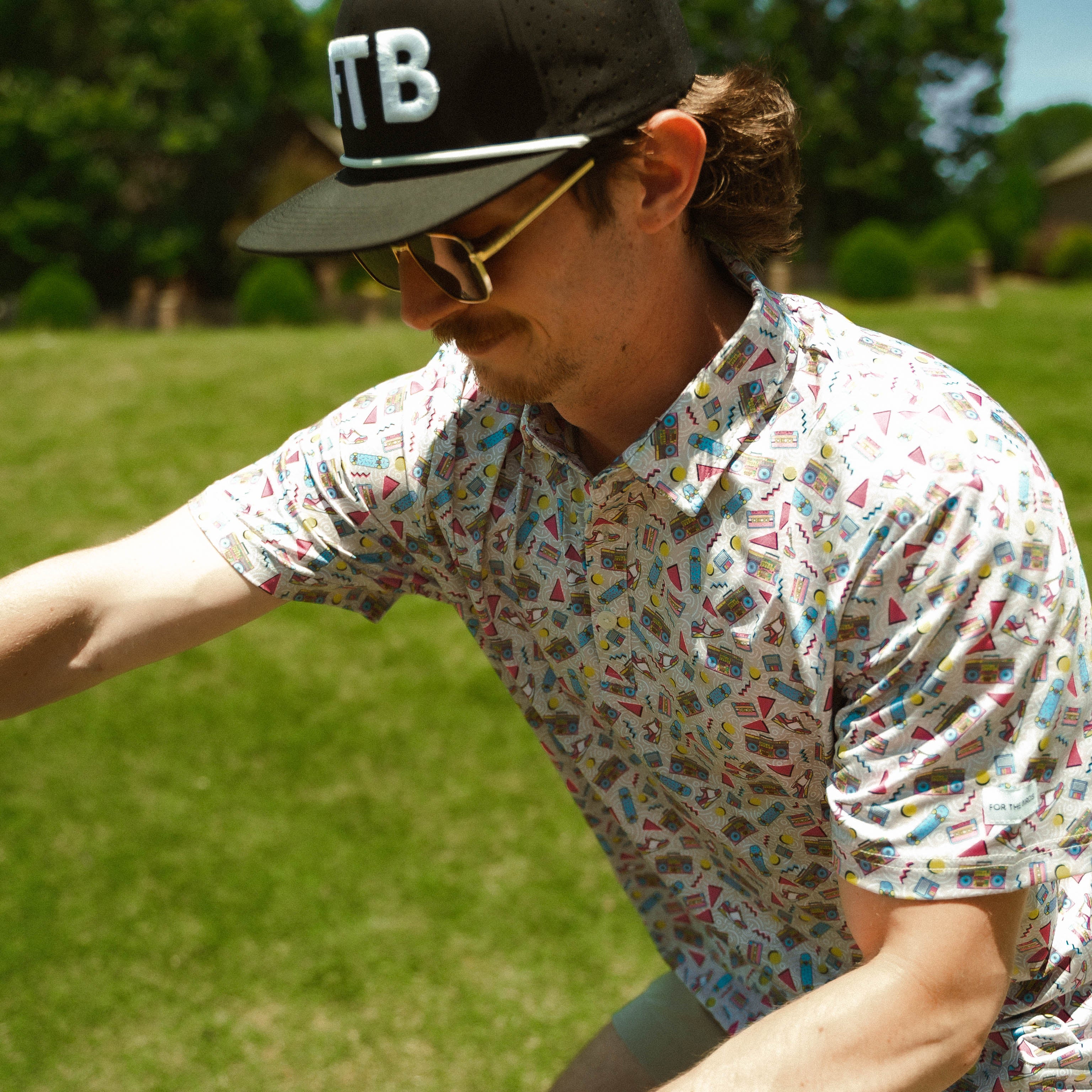 Ftb golf mens patterned golf polo with a throwback 90s design