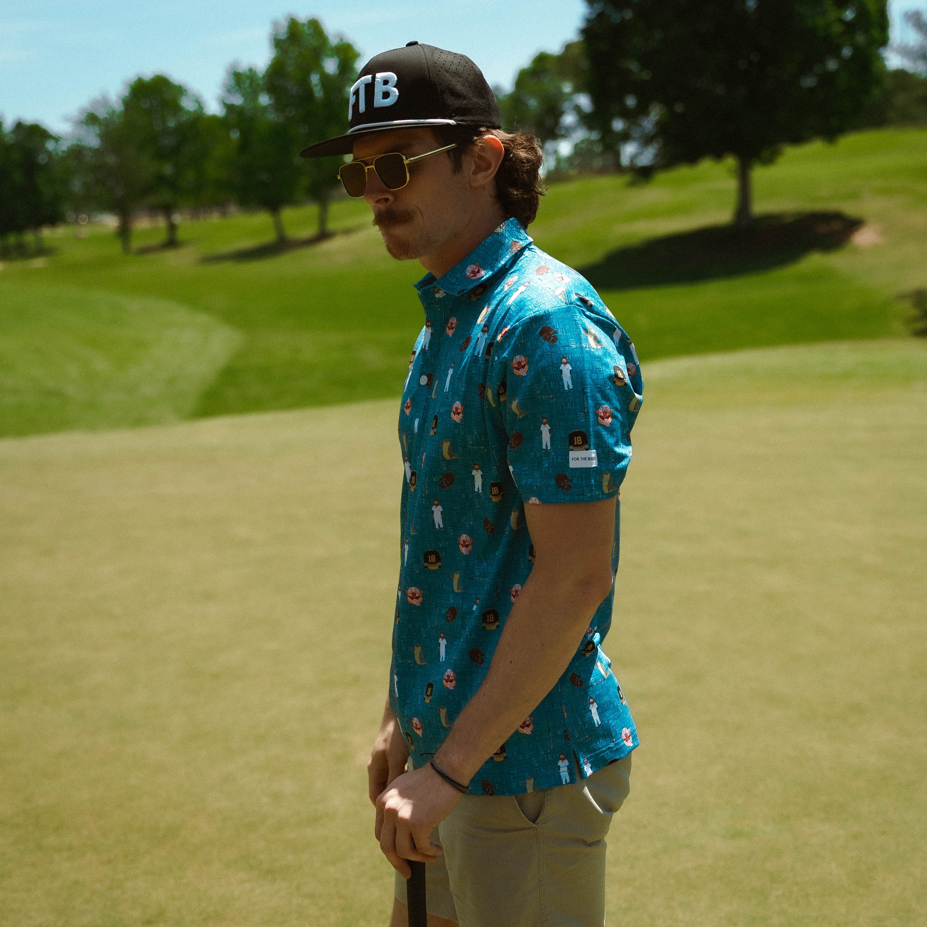 For the birds golf Gilmore patterned golf polo
