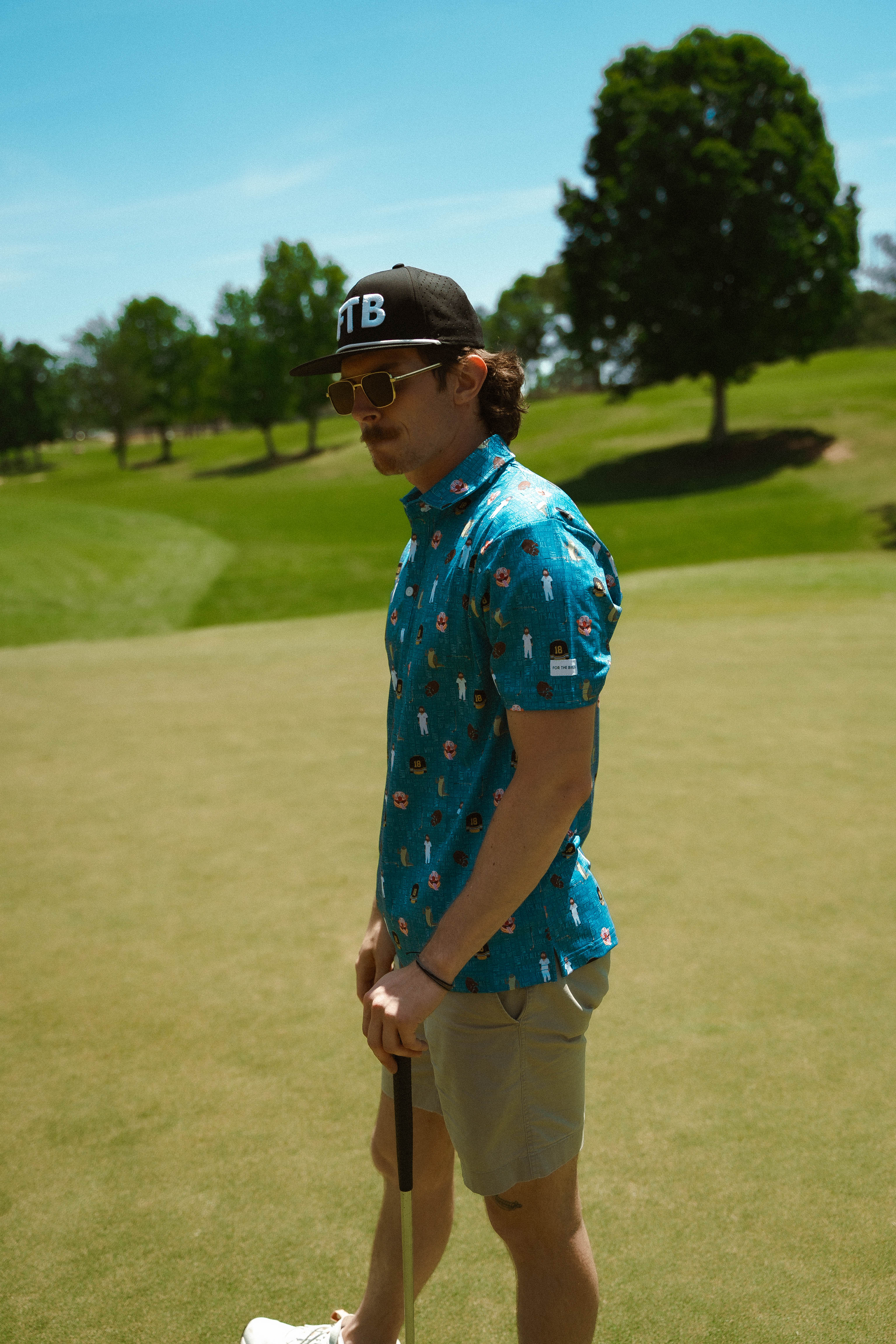 For the birds golf Gilmore patterned golf polo