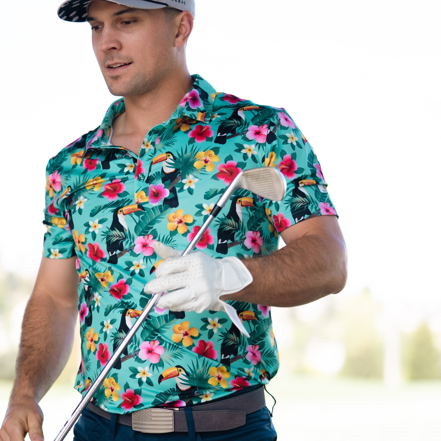 Adam Frazier wearing for the birds golf polo toucan man tropical Hawaiian polo