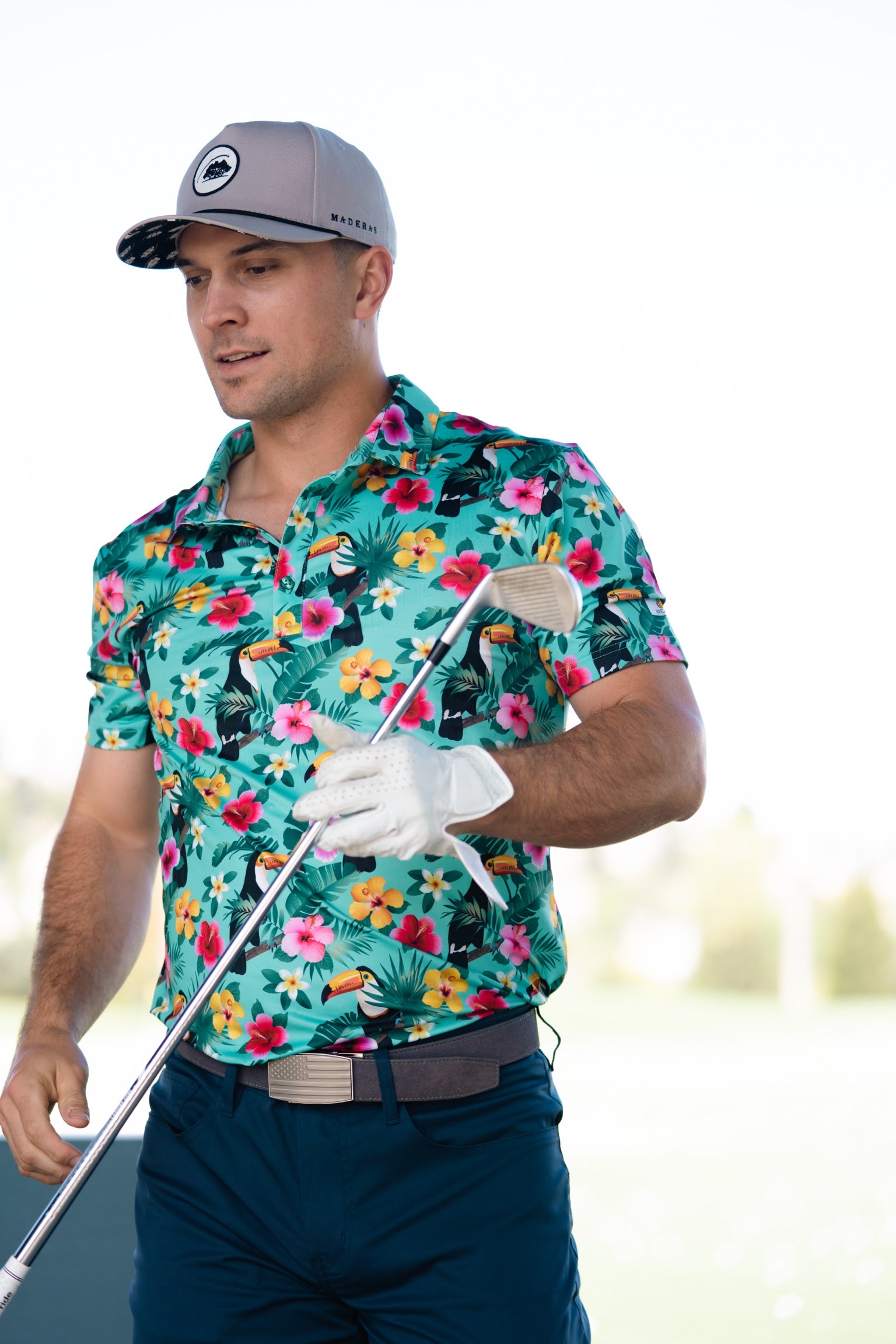 Adam Frazier wearing for the birds golf polo toucan man tropical Hawaiian polo