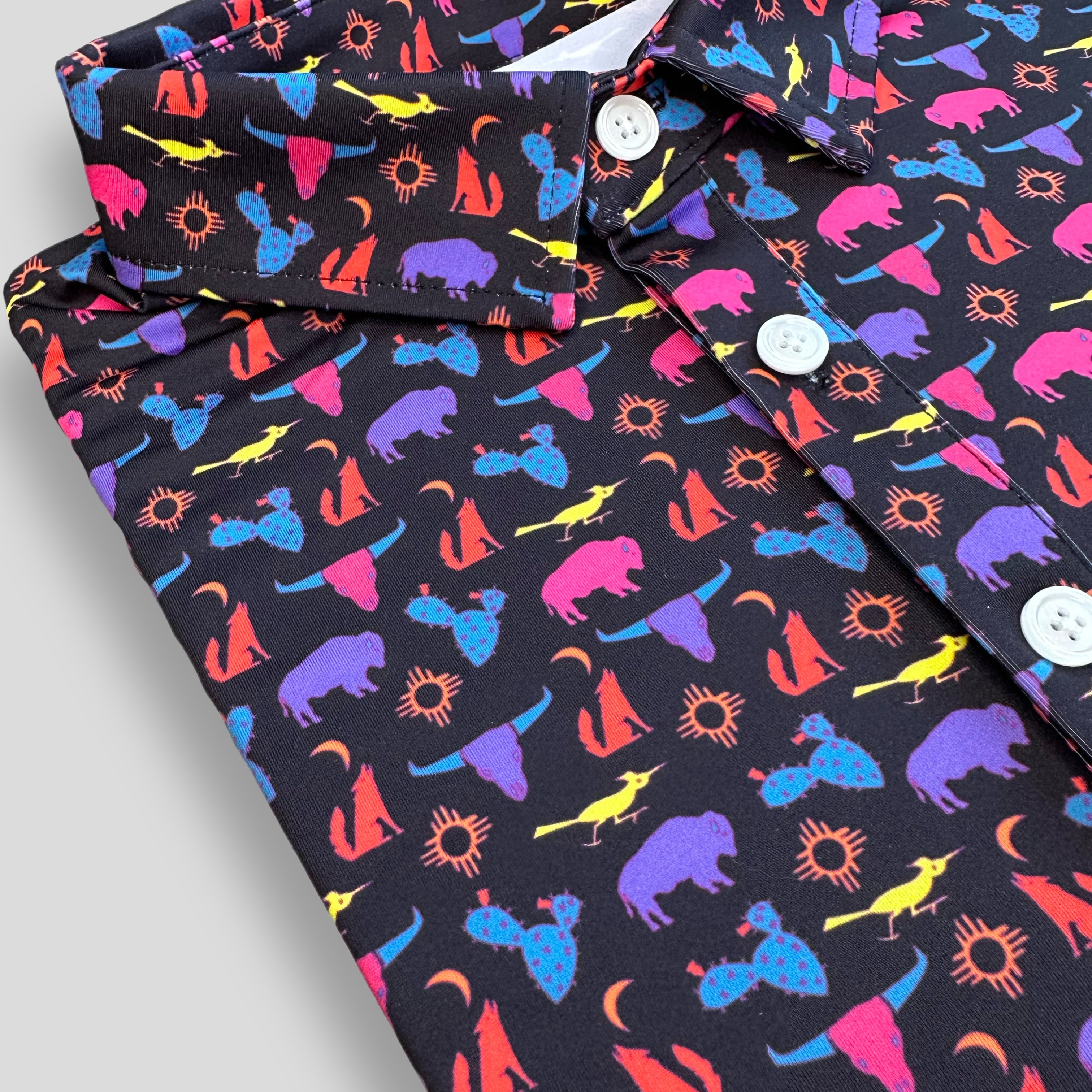 FTB Golf southwestern desert polo made with moisture wicking performance material. It has cactus, buffalos, coyotes, and more! Fun golf polo for any occasion