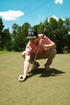 Awesome bright men’s golf polo by for the birds golf co with throwback zig zag pattern
