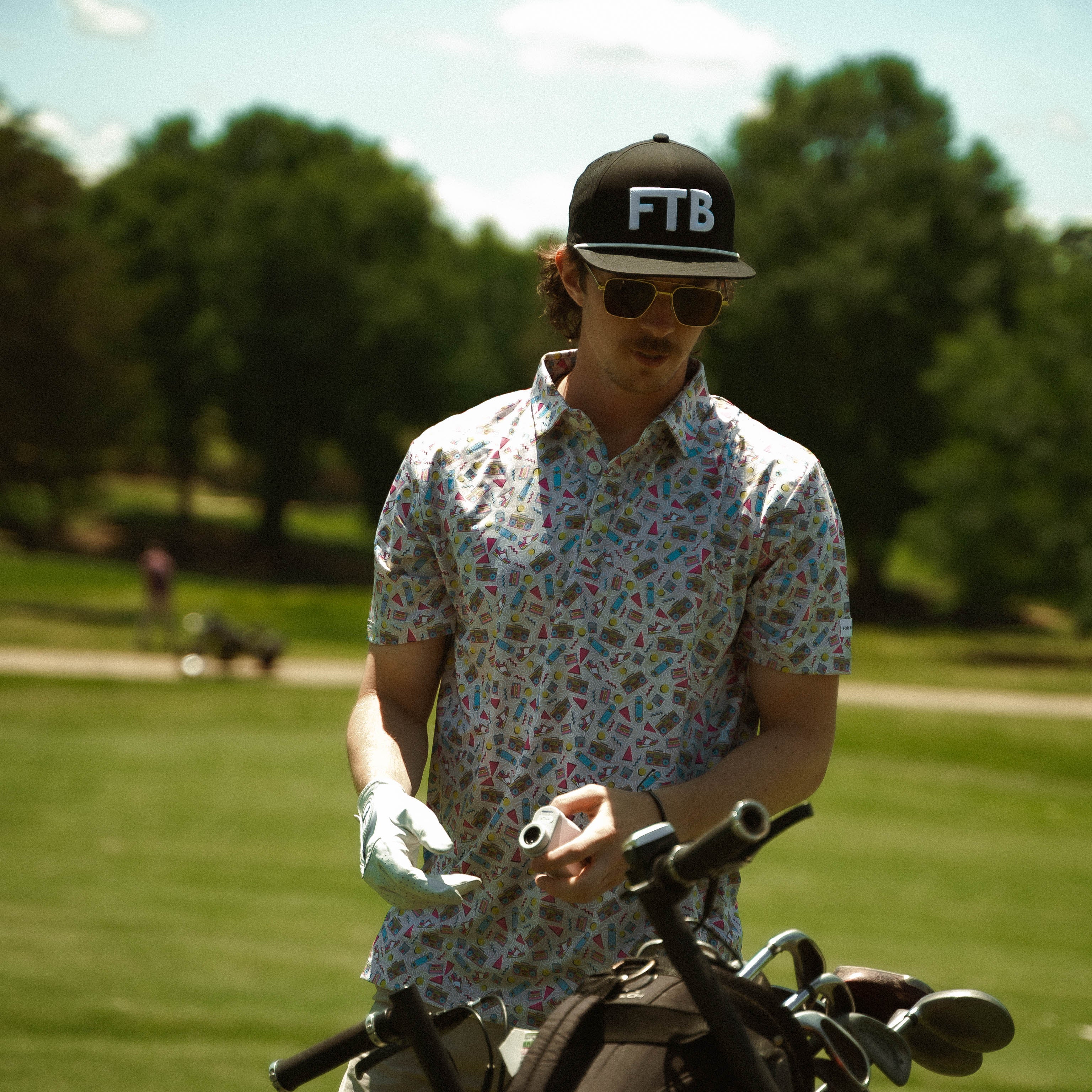 For the birds golf mens patterned golf polo with a throwback 90s design