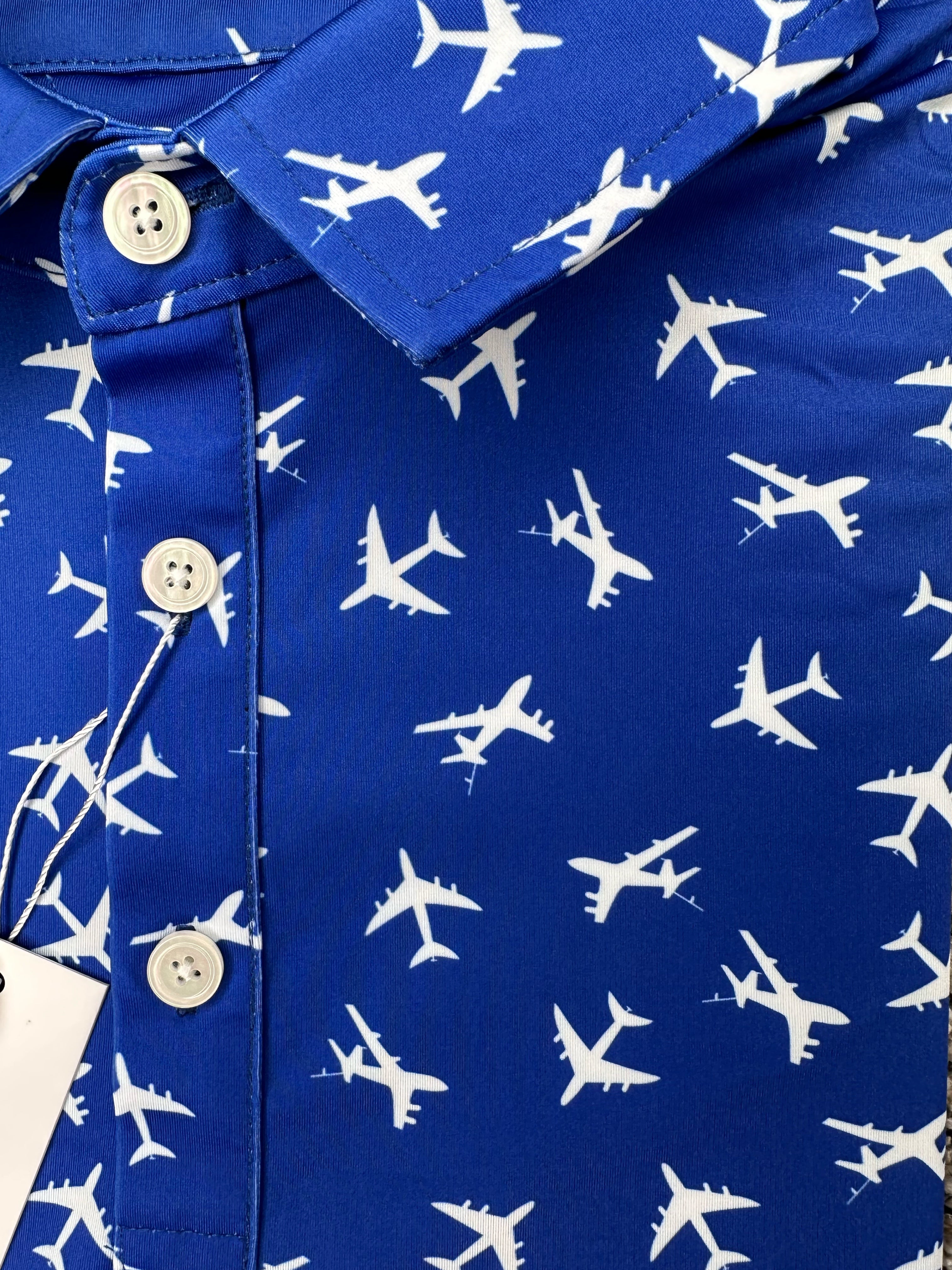 For the birds fun men’s golf polos that come in awesome patterns such as tropical, vintage 90’s, dad themed, and more.