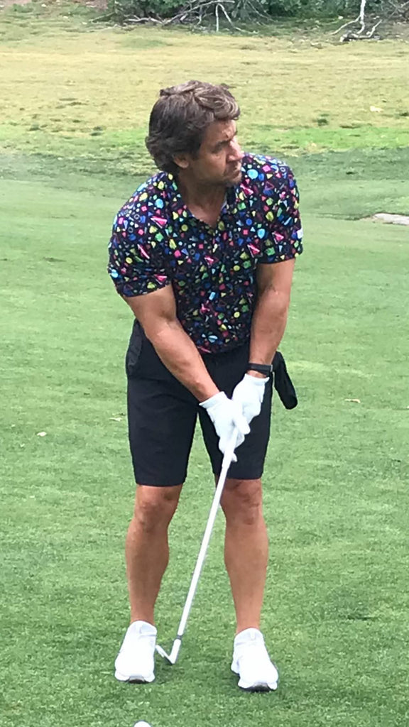 Bret Boone wearing Breasy apparel field day throwback 90s print golf polo