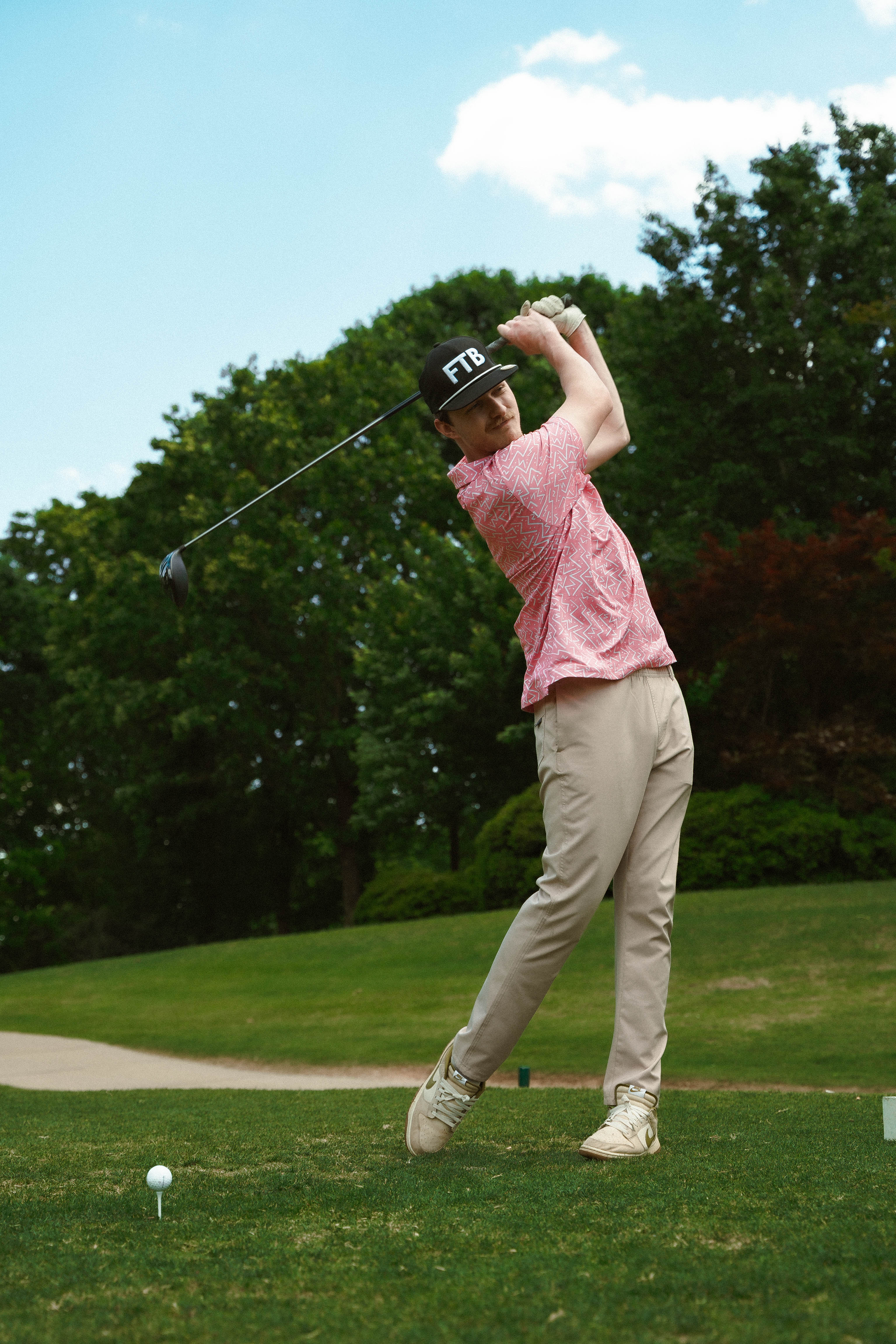 Awesome bright men’s golf polo by for the birds golf co with throwback zig zag pattern