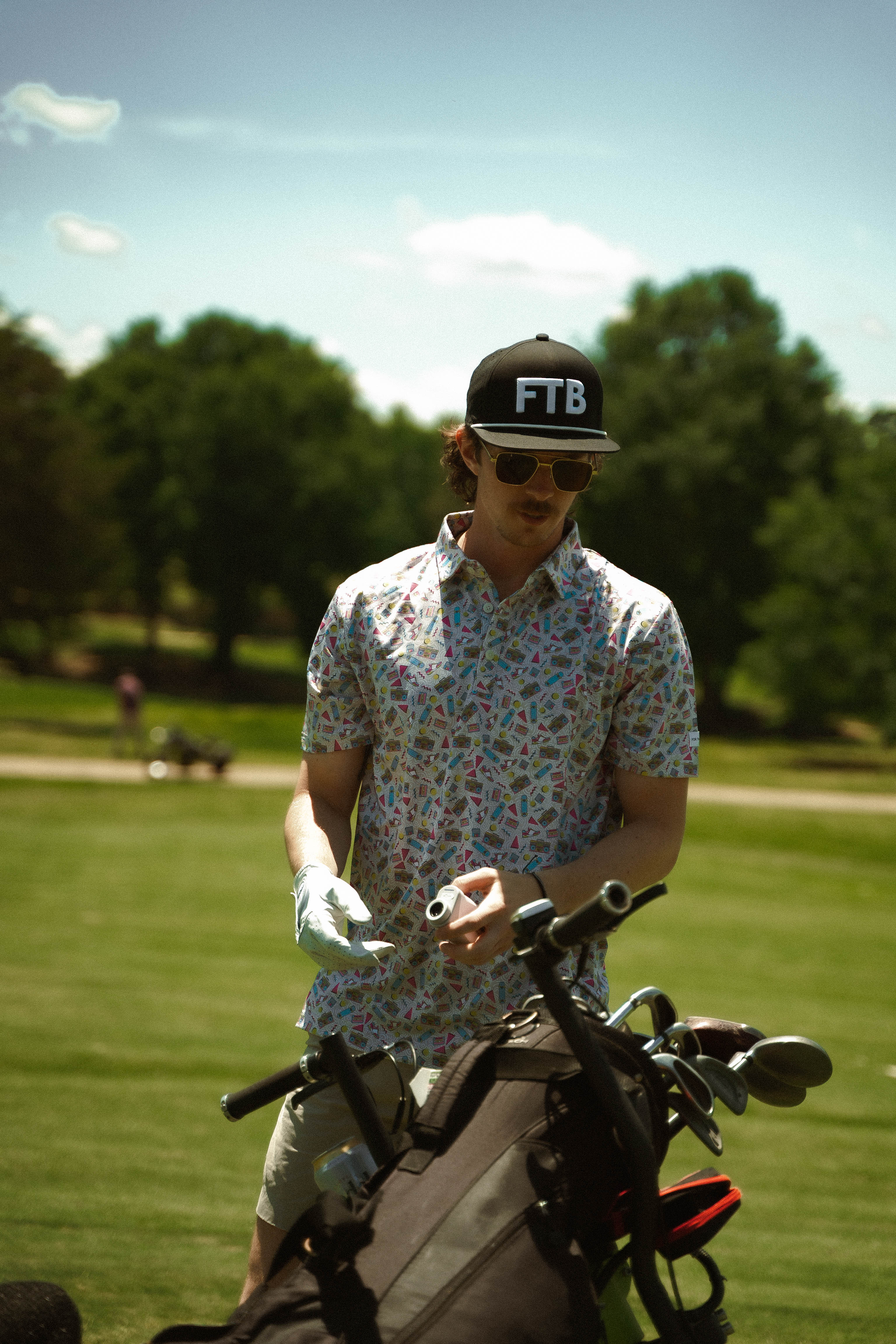 For the birds golf mens patterned golf polo with a throwback 90s design 